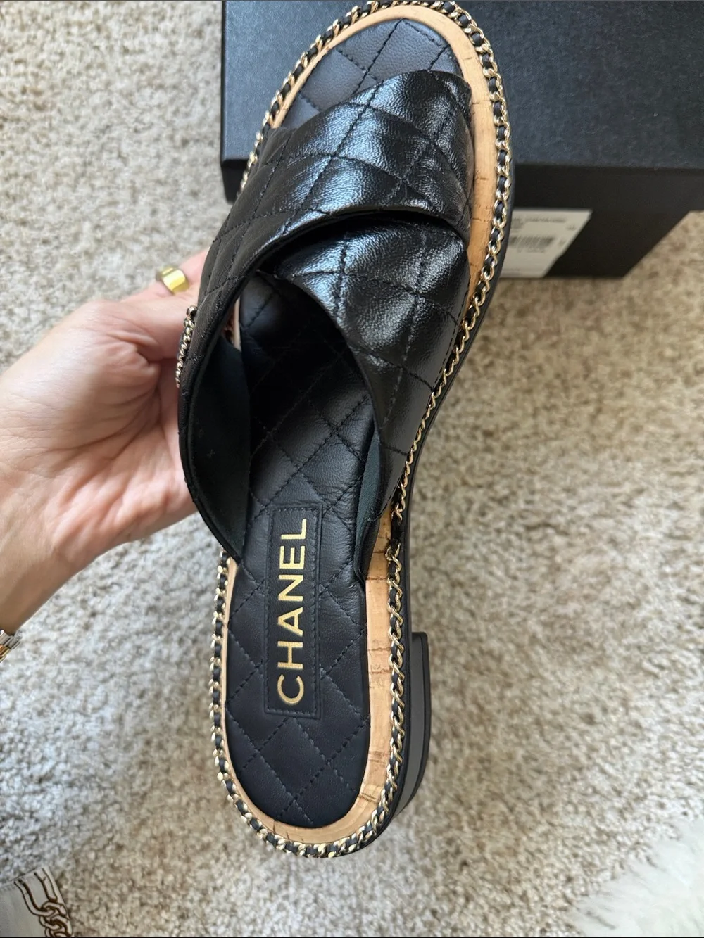 CHANEL Black Quilted Leather Crisscross Slide Mules with Chain Accent